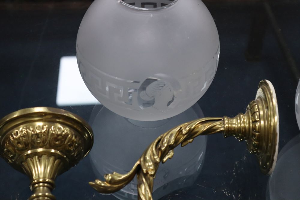A pair of 19th century French brass single sconce wall lights with etched glass shades, height 25cm